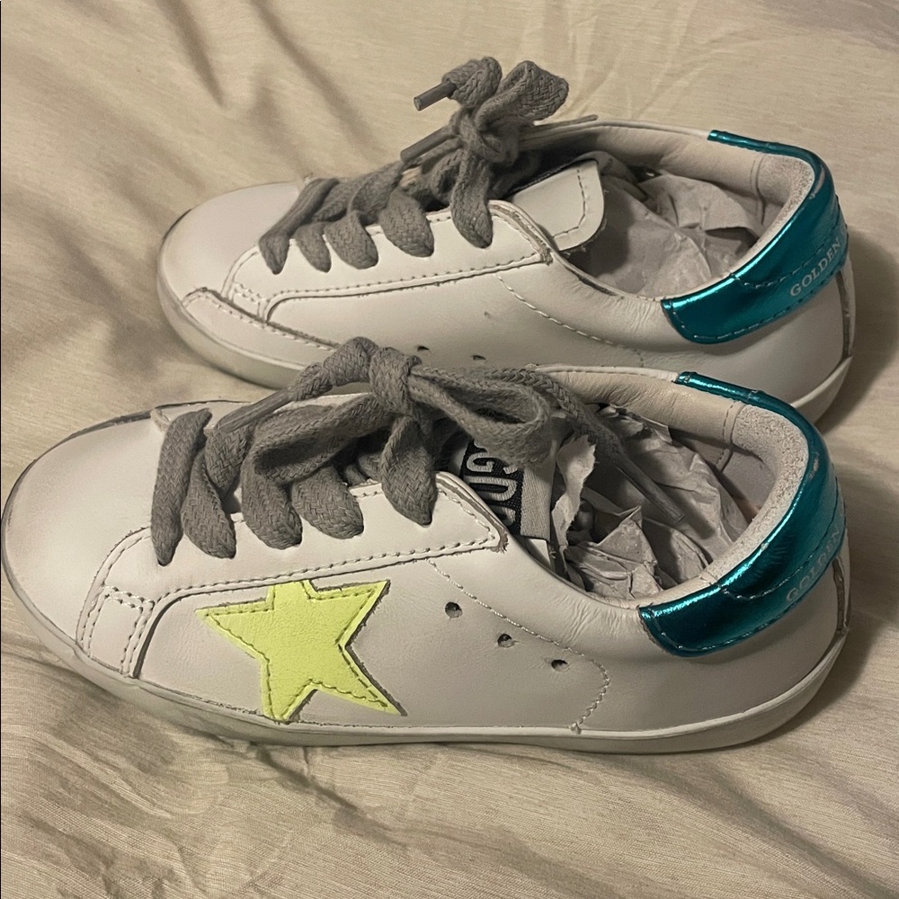 Baby Golden Goose Sneakers.
Never worn, but box not included. US 4/5.